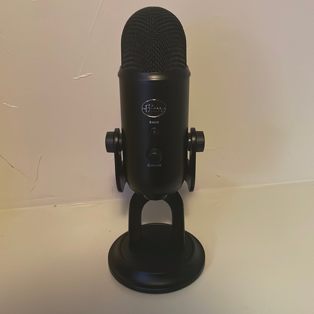black, blue yeti microphone